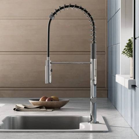 Chalet Single-Handle Pull-Down Kitchen Faucet In Chrome with Solid Brass Construction 360-Degree Swivel Deck Plate installed in kitchen