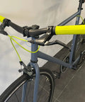 Bicycle with neon yellow handlebar grips and cables featuring 4Mm And 5Mm Aluminum Alloy Bicycle Derailleur Shifter Cable Housing End Caps