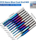 Ten colorful nano blue coat end mills with 1/8" shank diameter, arranged in a row, used for precise cutting and engraving.
