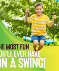 Child enjoying Kick Stand Up Tree Swing For Backyard And Outdoor Swingsets Kid Friendly Platform Swing With Adjustable Handles Weatherproof