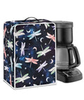Straight Up Dragonfly Print Coffee Maker Cover Washable Heavy Duty Shield For Kitchen Small Appliances Foldable Waterproof Polyester Slipcover With Sturdy Grip Handle beside a black coffee maker on a white background.