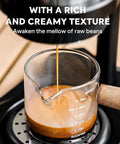 Dope Portable Manual Espresso Maker With 12 Bar Pressure Handheld Coffee Press No Cord Hassles Pre Infusion Brewer Rich Crema Shot Cup pouring rich espresso into a glass measuring cup.