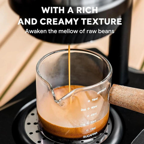Dope Portable Manual Espresso Maker With 12 Bar Pressure Handheld Coffee Press No Cord Hassles Pre Infusion Brewer Rich Crema Shot Cup pouring rich espresso into a glass measuring cup.