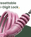 Close-up of pink resettable combination dial on 4 Foot Cable Bike Lock With Half Inch Resettable Combination And Mounting Bracket In Baby Pink For Bicycle Electric Scooter Motorcycle Dope Security And Versatility On The Go
