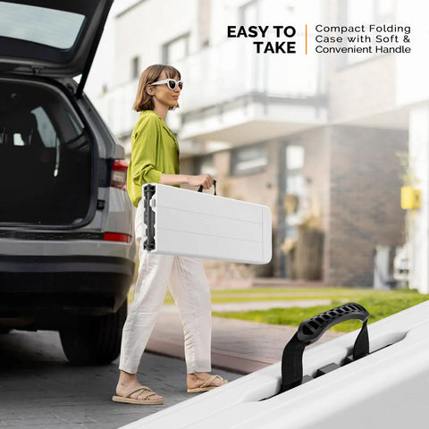 Woman carrying 6 ft folding picnic bench with HDPE tabletop, easy to fold and store, portable for parties, camping, picnics