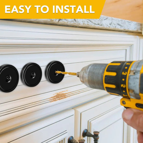 Person installing Neodymium Cup Magnets With Countersunk Holes And Stainless Screws, Heavy Duty Holding Up To 110 Lbs Per Magnet, Black Pack Of 12 on cabinet