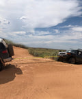 Off-road recovery of a stuck Jeep using a 2 Inch Shackle Hitch Receiver Set With Three Quarter Inch D Ring, 45000 Lb Break Strength.