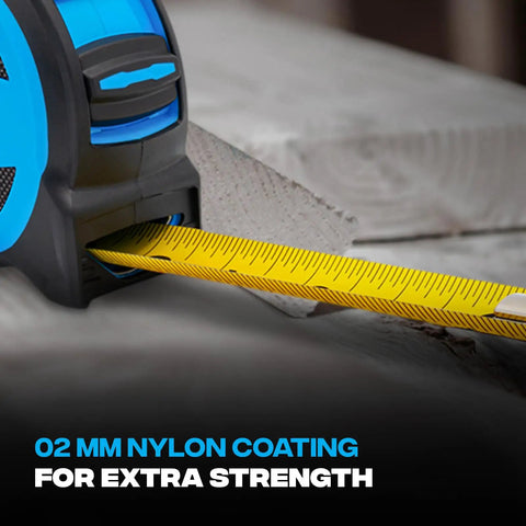 Close-up of Rugged 25 Ft Tape Measure with Nylon Coated 1.25 Inch Blade, Dual Magnet Hook on wooden surface.