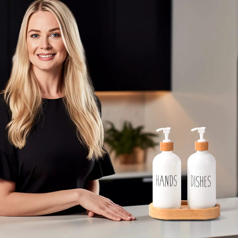 Smiling person next to Wooden Dish Soap Dispenser Set With Thick One Inch Tray And Non Slip Base For Modern Boho Farmhouse Kitchen Countertop Decor White Finish Keeps Soap From Making A Mess And Adds Warm Rustic Vibe