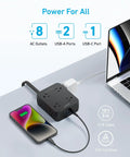 11 In 1 Power Strip With 2000J Surge Protector, 10ft Cord, 8 AC Outlets, 2 USB A Ports And 1 USB C Port, 20W Fast Charging, Overload Safe, Ideal For Home Office And Bedroom Electronics, black compact power strip on desk with laptop and phone