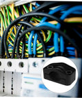Knockout Quality High Voltage Cable Clamp Grips Wiring Harness Rock Solid For Distribution Box Wire Clutter Control And Dead Simple Electrical Routing Saves Real Time Effort In Black, shown in a wiring harness setup.