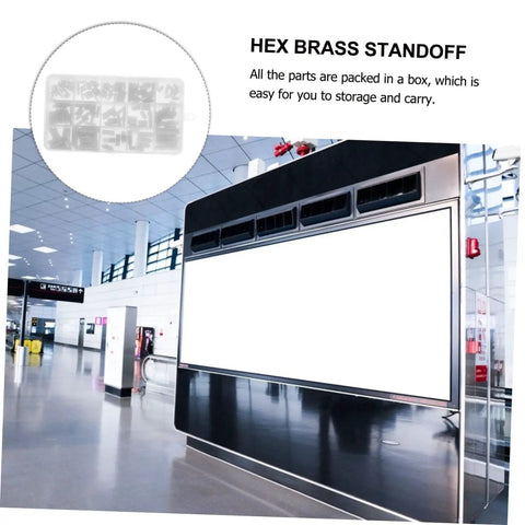 Hex brass standoff set displayed in a compact storage box against a modern airport terminal backdrop.