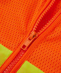 Close-up of the zipper on Heavy Duty Neon Orange Mesh Safety Vest With Seven Pockets And 3M Reflective Tape For Top Shelf Day And Night Visibility Ansi Isa Class 3 Rated And Built For The Daily Grind.