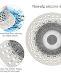 Universal Shower Drain Cover With Slim Hair Catcher And Raised Dome To Snag Strands Soap Chips And Sink Gunk While Keeping Water Flowing Smooth For Easy Rinse And No Sweat Drain Care On Standard Or Pop Up Drains Light Gray showing non-slip silicone ring design.