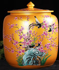 Big Ol Ceramic Rice Canister With Tight Lid For Keeping Flour Grains And Dry Goods Fresh, large yellow ceramic container with floral design.