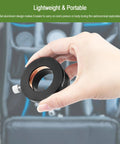 Hand holding 2 Inch To 1.25 Inch Eyepiece Adapter For Telescope, Built Tough Metal Construction With Premium Thumbscrew and Brass Locking System.