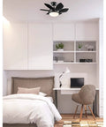 Quince 24 Inch LED Ceiling Fan With Light In Gun Metal Finish in small bedroom, reversible black and graphite blades, opal glass