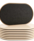 Eight Pack Heavy Duty Furniture Sliders For Carpet And Hardwood Flooring featuring cushioned pads stacked in light beige and black.