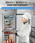 Chef holding fish in front of open 54 Inch Wide Two Door Commercial Freezer Featuring 49 Cubic Feet Of Sleek Stainless Steel Build.