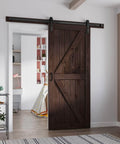 Brown Barn Door 36 Inch By 84 Inch With Six Point Six Foot Barn Door Hardware Track Kit And Handle Included Double Surface Easy Assembly K Frame Coffee Finish Spruce Wood Construction installed in room.