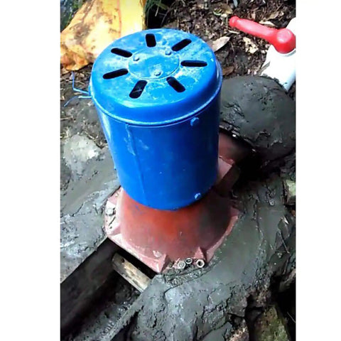 Micro Hydroelectric Generator 1500W 220V with blue casing and cast iron shell, installed outdoors for off-grid power