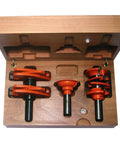 Hardcore Three Piece Router Bit Set For Entry AND Interior Doors Featuring Anti Kickback Design AND Nonstick Orange Shield Coating with tough carbide edges in wooden case.