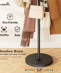 Heavy Duty Freestanding Coat Rack With Stable Wood Base And Metal Frame, 12 Hooks For Jackets Hats Bags close-up.