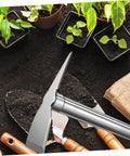 Rustproof Stainless Steel Garden Hoe Handheld Weeding Tool With Ergonomic Grip next to garden seedlings and soil