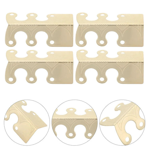 Set of four rugged antique alloy corner protectors with prepunched holes, designed for durability and easy mounting on furniture.