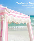 Boho Beach Cabana With Fringe And Tassels, 7x7 Ft Easy Setup Canopy With Premium Wood Poles in Rose Stripes on Beach