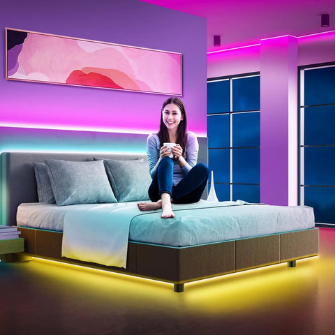 Woman in bedroom with Two Rolls 130 Ft LED Strip Lights For Bedroom Color Changing Lights With Music Sync App Control And Remote