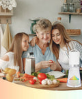 Glowing Electric Snow Cone Maker For Home Use Quick Ice Crusher With 2 Easy Clean Molds on countertop with family preparing fresh ingredients.