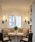 Black Wall Sconces Set Of Two Modern Farmhouse Candle Wall Lamps with Matte Finish in a cozy breakfast nook