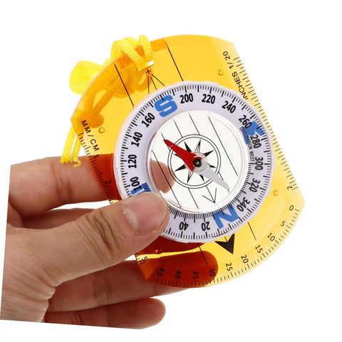 Adventure Ready Outdoor Precision Compass with ruler, luminous pointer, and safety lanyard held in hand