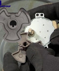 Turntable Motor Coupler For GE Microwaves Replacement Part That Keeps Your Microwave Running Smoothly And Plug And Play Install Fits DVM And EMO Models WB06X10144 gray plastic coupler shown installed
