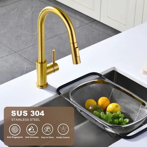 Top Shelf Brushed Gold Kitchen Faucet With Drip Free Pull Down Sprayer And Included Deck Plate Heavy Duty Solid Brass Valve Low Lead Stainless Steel Build No Sweat Install For Modern Homes above a sink with fresh produce.