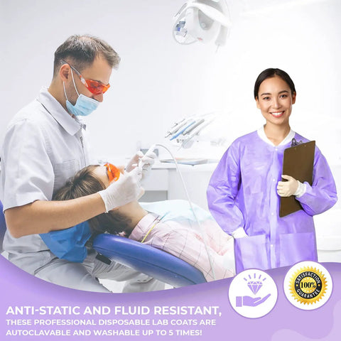 Dentist wearing mask with patient in chair, woman in purple knee-length lab coat, knit cuffs, clipboard, clinic setting.