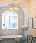 Two-Tier Farmhouse Glass Chandelier With Seeded Glass Shades in cozy bathroom setting, creates warm glow with modern style.