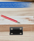 Sturdy as Nails Stainless Steel L Shape Corner Braces Four Piece Set With Screw Holes on wooden board with pencil