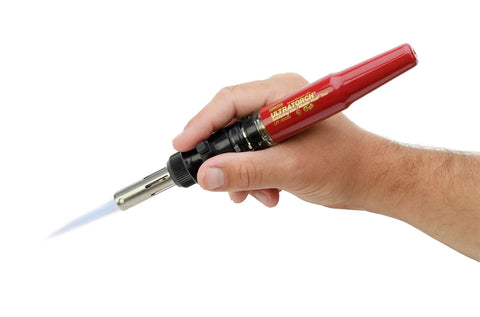 Hand holding Ultratorch UT-50 Pen Sized Butane Powered 3 In 1 Heat Tool Soldering Iron Flameless Heat Tool And Pinpoint Torch