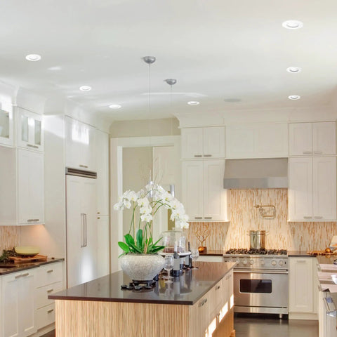 Modern kitchen with Ultra Slim LED Integrated Recessed Lighting Kit Four Pack 6 Watts Energy Star IC and Wet Rated.
