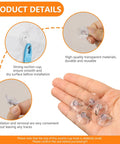 Forty Pack Mini Clear Suction Cup Hooks With Sleek Metal Utility Rings, hand showcasing transparent suction cups with metal rings.