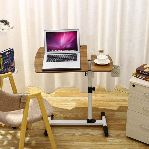 Slick Rolling Laptop Desk With Totally Adjustable Height And Easy Tilt Panel, medium fiberboard top, laptop and coffee on side table.