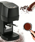 Next Level Automatic Espresso Tamper For 58Mm Portafilters featuring a sleek black design and a portafilter with coffee grounds.