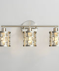 Three Light Brushed Nickel Vanity Light Fixture With Cylinder Crystal Shades Over Mirror Slick Modern Wall Sconce