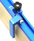 Rock Solid Dead On T Track Flip Fence Stop For Woodworking Router Tables And Saws With Five Sixteenths Inch T Bolt Universal Multi Track Compatible Die Cast Aluminum 2 Pack Heavy Duty Gear, close-up of adjustable blue aluminum clamp.