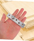 Heavy Duty Concealed Door Pivot Hinge In Stainless Steel Rotatable Hidden Hinge for cabinet and bookcase doors displayed in hand