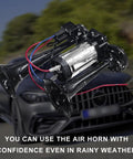Badass 12V Dual Trumpet Air Horn Kit With Heavy Duty Compressor, showing dual trumpets and compressor, designed for rainy weather use.
