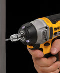 FlexTorq Magnetic Bit Holder For Impact Tools, 2 Inch Length, Impact Ready Bits attached to drill in use