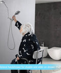 Elderly person using 16 Inch Shower Arm Extension Solid Brass Adjustable Height With Universal G1/2 Connection in bathroom.